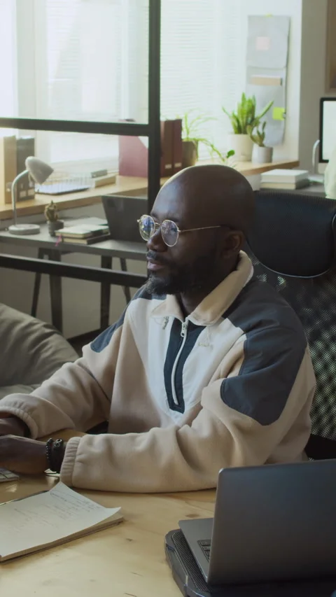 Ecstatic Black Male Developer Cheering at Successful Software Test Stock Footage 293929416