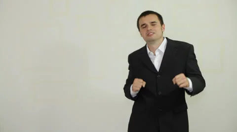 Ecstatic businessman dancing 库存影片 24830566