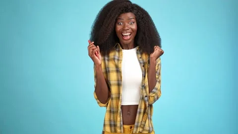 Ecstatic lady device win catch package noel isolated blue color background Stock Footage 166158532