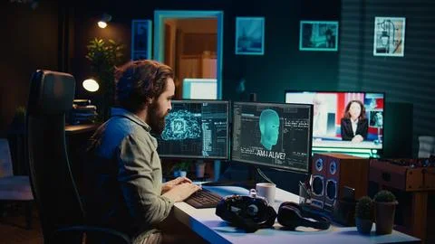 Ecstatic man celebrating after awakening AI using VR headset Stock Photos