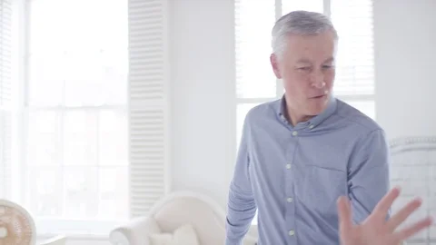 Ecstatically happy man dancing at home by himself Stock Footage 88161069