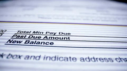 ECU ACROSS A BILLING STATEMENT.  4K.  CLEARED ARTWORK.  NO PEOPLE. Video stock 147951301