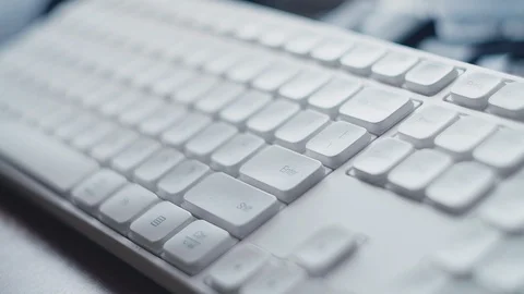 ECU Finger pressing white computer Enter key. Finger pressing multiple times the Stock Footage 127021059