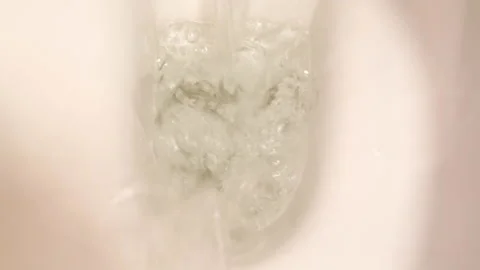 ECU of flushing toilet. Stock Footage 167571011