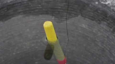 ECU Ice Fishing Bobber Gets Bite Stock Footage