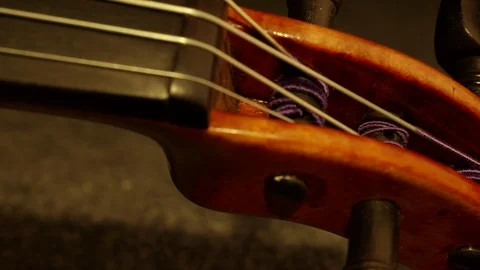 ECU, MACRO SLIDER SHOT ON THE HEAD STOCK OF A VINTAGE VIOLIN.  4K, 10 BIT, 4:2:2 Stock Footage 127188617