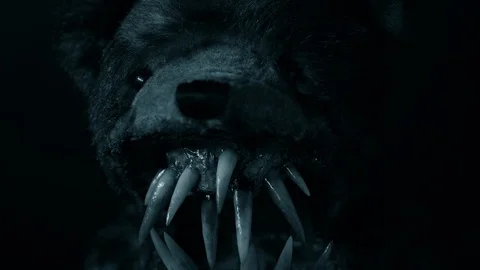 ECU PULL BACK ON HIDEOUS TEDDY BEAR.  LIGHTNING EFX.  4K, 10 BIT, 4:2:2. Stock Footage 124672145