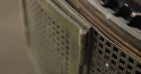 ECU, Rack Focus and Tracking Shot of Casting Machine at a Battery Factory (4K) Video stock 60765698