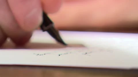 ECU writing letter Stock-Footage 11924898