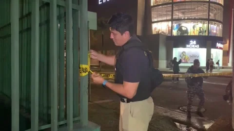 Ecuador's Prosecutor's Office reconstructs arrest of murdered minors with invest Stock Footage 304381024