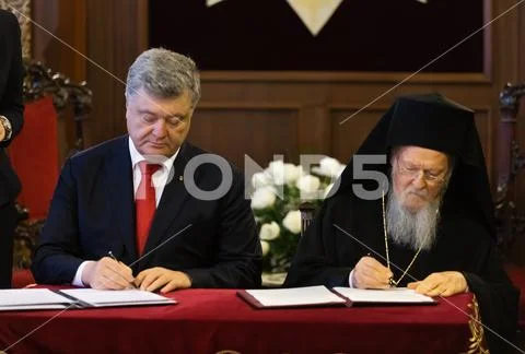 Ecumenical Patriarch Bartholomew and pesitent of Ukraine Petro Poroshenko Stock Photos