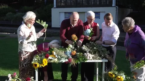 Ed Davey arranges flowers on third day of conference Stock Footage 317543950