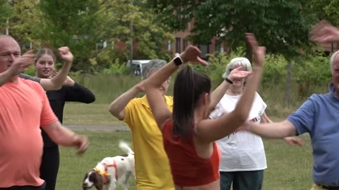 Ed Davey takes on Zumba while talking about bereavement payment plans Stock Footage 278416938
