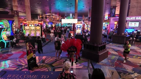 ED: LV, NV, US 8/25/25: Showgirls Parade Through Bustling New York New York Stock Footage 318736827