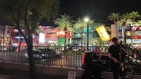 ED: LV, NV, US 8/25/25: Night Stroll Along Las Vegas Blvd With Lively Street Stock Footage 318736991