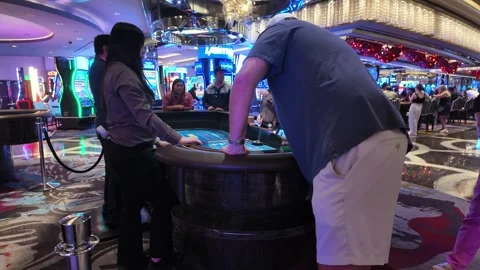 ED: LV, NV, US 8/25/25: Craps Shooter Concentrating at Las Vegas Cosmopolitan Stock Footage 318925711