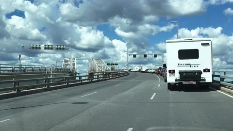 ED: Sarnia, ON, CA 08/23/2025: Long Lines of Cars on Blue Water Bridge to Port Stock Footage 316771282