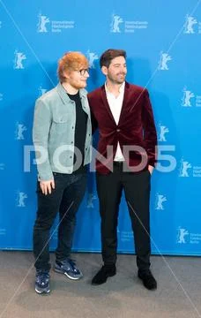 Ed Sheeran and Murray Cummings pose during Berlinale 2018 Stock Photos