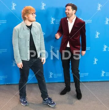 Ed Sheeran and Murray Cummings pose during Berlinale 2018 Stock Photos