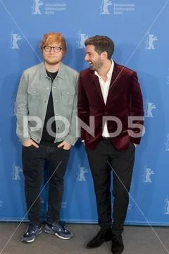 Ed Sheeran and Murray Cummings pose during Berlinale 2018 Stock Photos