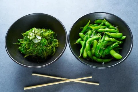 Edamame soya beans and Algae salad Stock Photos