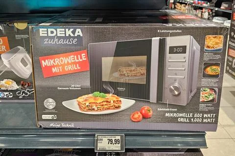 Edeka zuhause microwave with grill function packaging in store Stock Photos