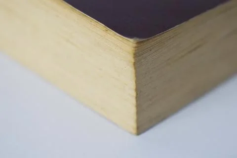 Edge of book on white background Stock Photos