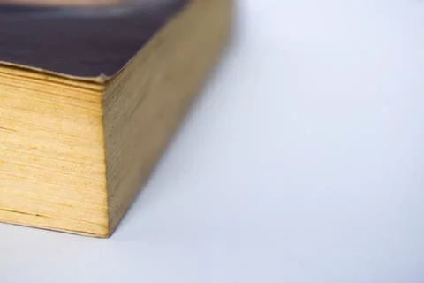 Edge of book on white background Stock Photos