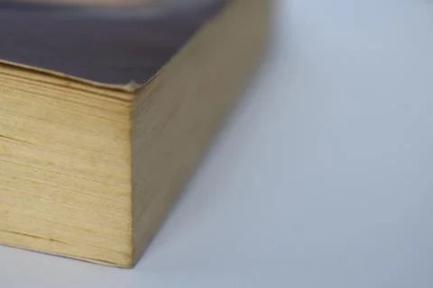 Edge of book on white background Stock Photos