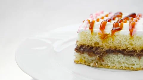 Edge of cake with cream and different jams on top Stock-Footage 54340904