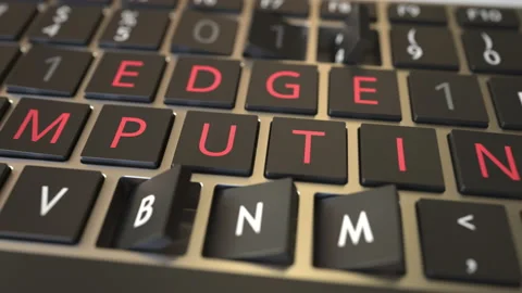 EDGE COMPUTING text being revealed with flipping keys of computer keyboard Stock Footage 170268891