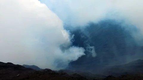 On the edge from the crater from the Bromo volcano on Java Indonesia Stock Footage 86500692