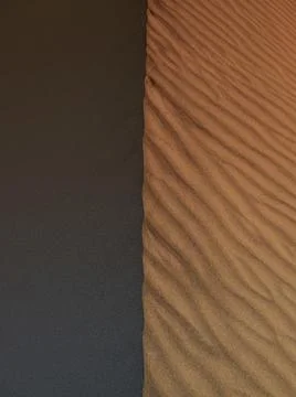 THE EDGE OF LIGHT OF A SAND DUNE Stock Photos