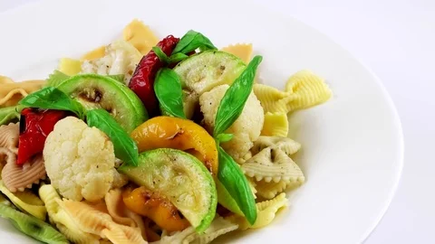Edge of plate with Farfalle pasta, copy space in right side Stock Footage 73654649
