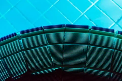 Edge of the pool at night Stock Photos