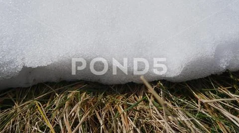 Edge of a snow drift in an Irish Bog Stock Photos