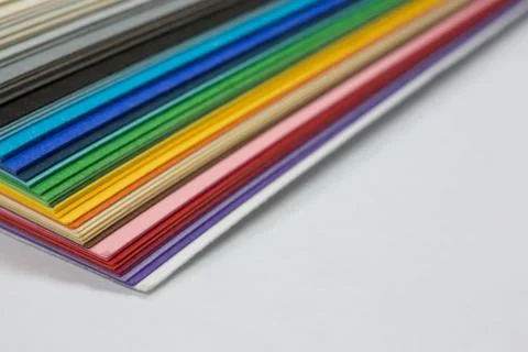 Edge of the stack of colored paper Stock Photos