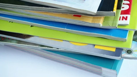 Edge stack of the colorful magazines Stock Footage 87748783