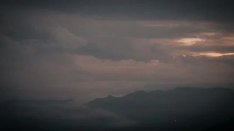 Edge of Sunrise Over Brooding Ridges and Sleeping Valley Lights Video stock 316795395