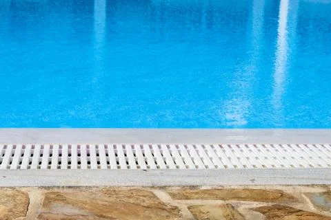 Edge of the swimming pool overflow Foto stock