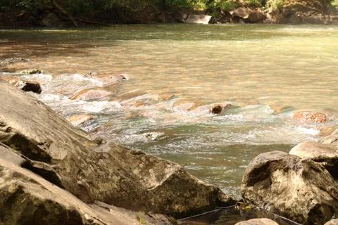 On the edge of the waterfall Stock Photos