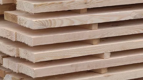 Edging board in stacks. Production of timber from wood Stock-Footage 97539491