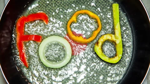 Edible composition of the word food made from the letters of vegetables Stock Footage 120426190