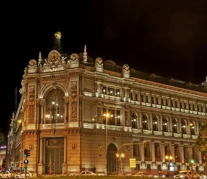Edificio Banco de Espana, Madrid Illuminated historic building at night wi... Stock Photos
