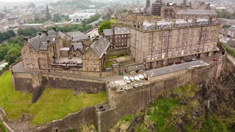 Edinburgh castle being inspected with abseiling engineers Stock Footage 167277022