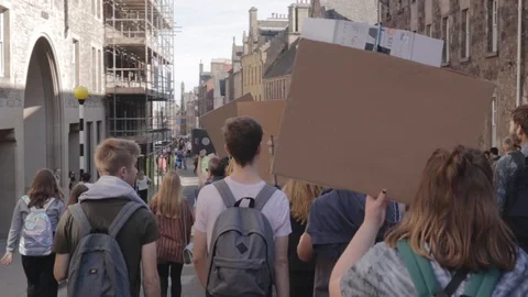 Edinburgh Climate March (3rd Global) - Students using makeshift signs Stock Footage 117827798