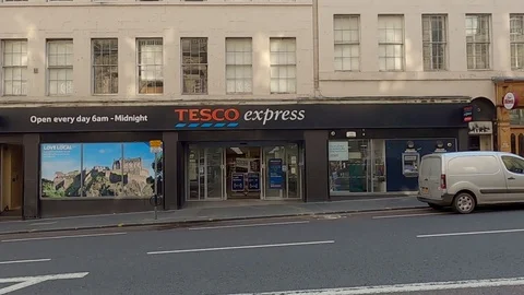 Edinburgh Lockdown Covid 19 Coronavirus 2020 quiet Tesco Express store Stock Footage 129317147