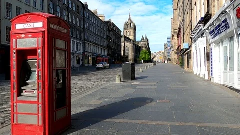 Edinburgh Lockdown Covid 19 Coronavirus Red cash machine Royal Mile Scotland UK Stock Footage 130136849
