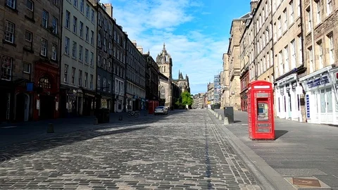 Edinburgh Lockdown Covid 19 Coronavirus Red cash machine Royal Mile Scotland UK Stock Footage 130137012