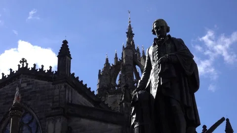 Edinburgh Royal Mile Adam Smith statue Low angle 4K Stock Footage
